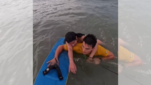 Screenshot from a video posted on Instagram by Brazilian athlete Bruno Lobo who saved a girl at sea.