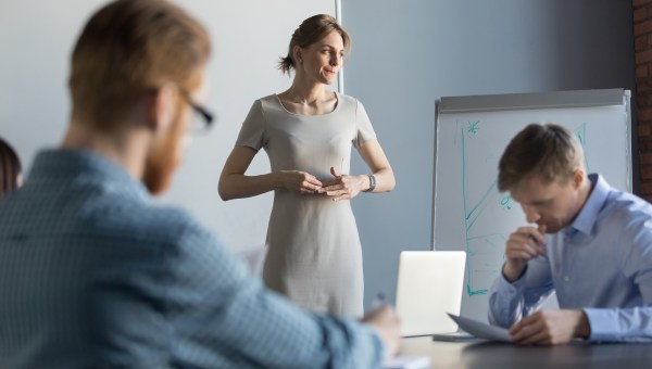 Stressed business woman leader executive in tension feels worried