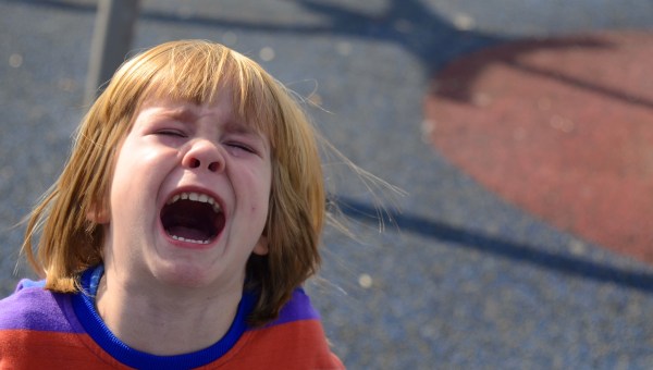 The little boy is screaming, crying a lot. Children's whims, tantrums
