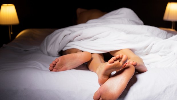 Couple sleeping in bed
