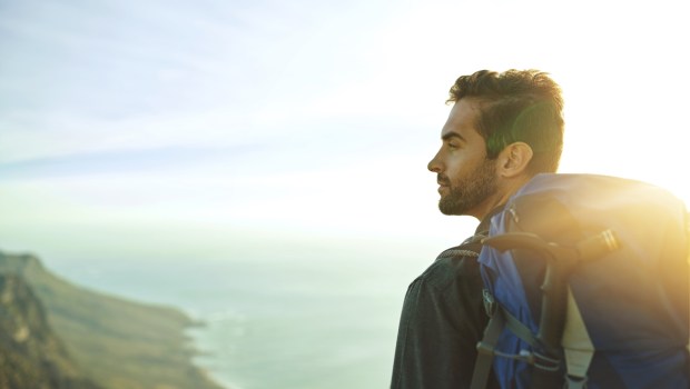 Man, mountain and backpacking for outdoor