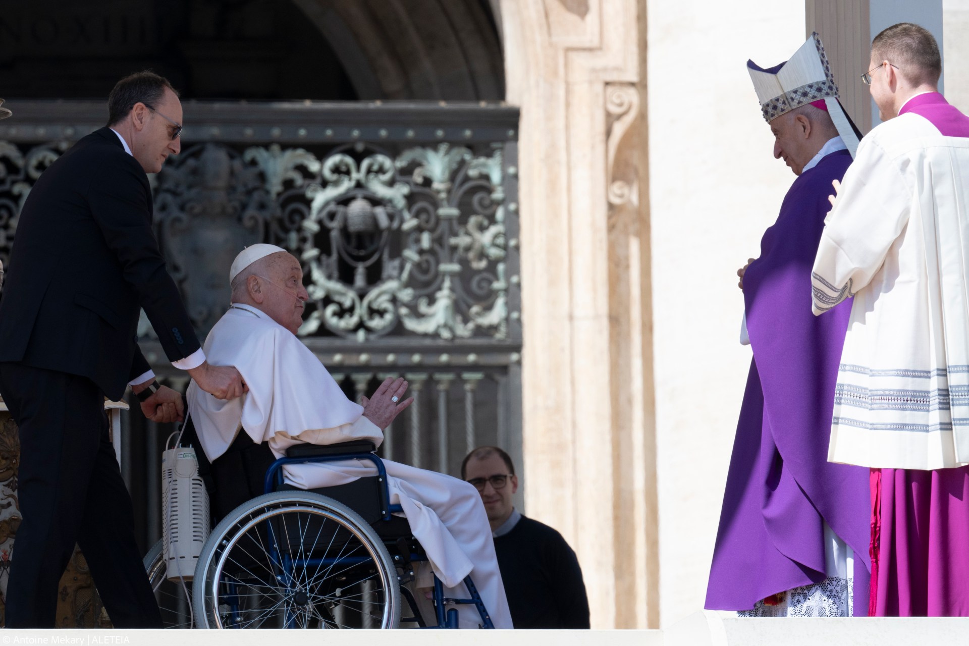 Pope Francis is pushed in a wheelchair on St. Peter's square to conduct the Angelus prayer in The Vatican, on April 6, 2025.