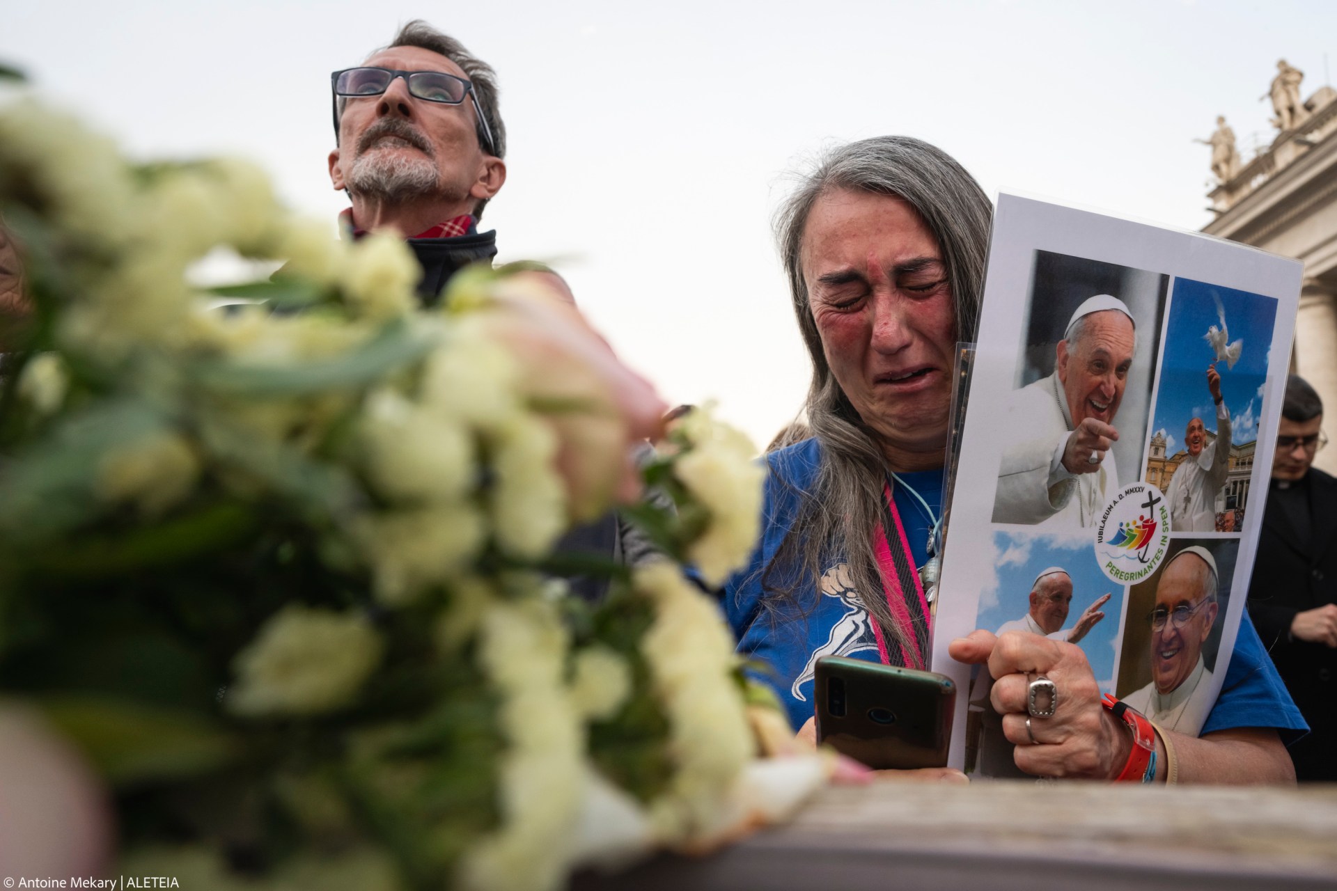 Devotees attend a Rosary in homage to Pope Francis following his death in Saint Peter's Square, the Vatican, on April 21, 2025
