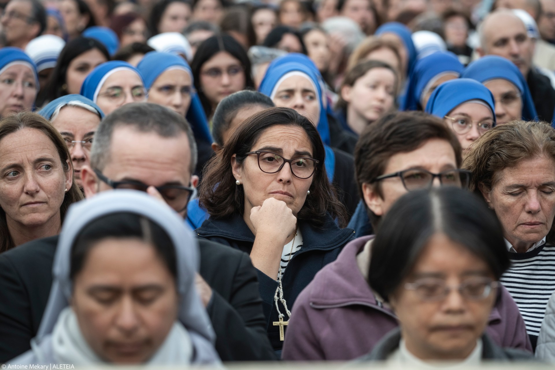 Devotees attend a Rosary in homage to Pope Francis following his death in Saint Peter's Square, the Vatican, on April 21, 2025