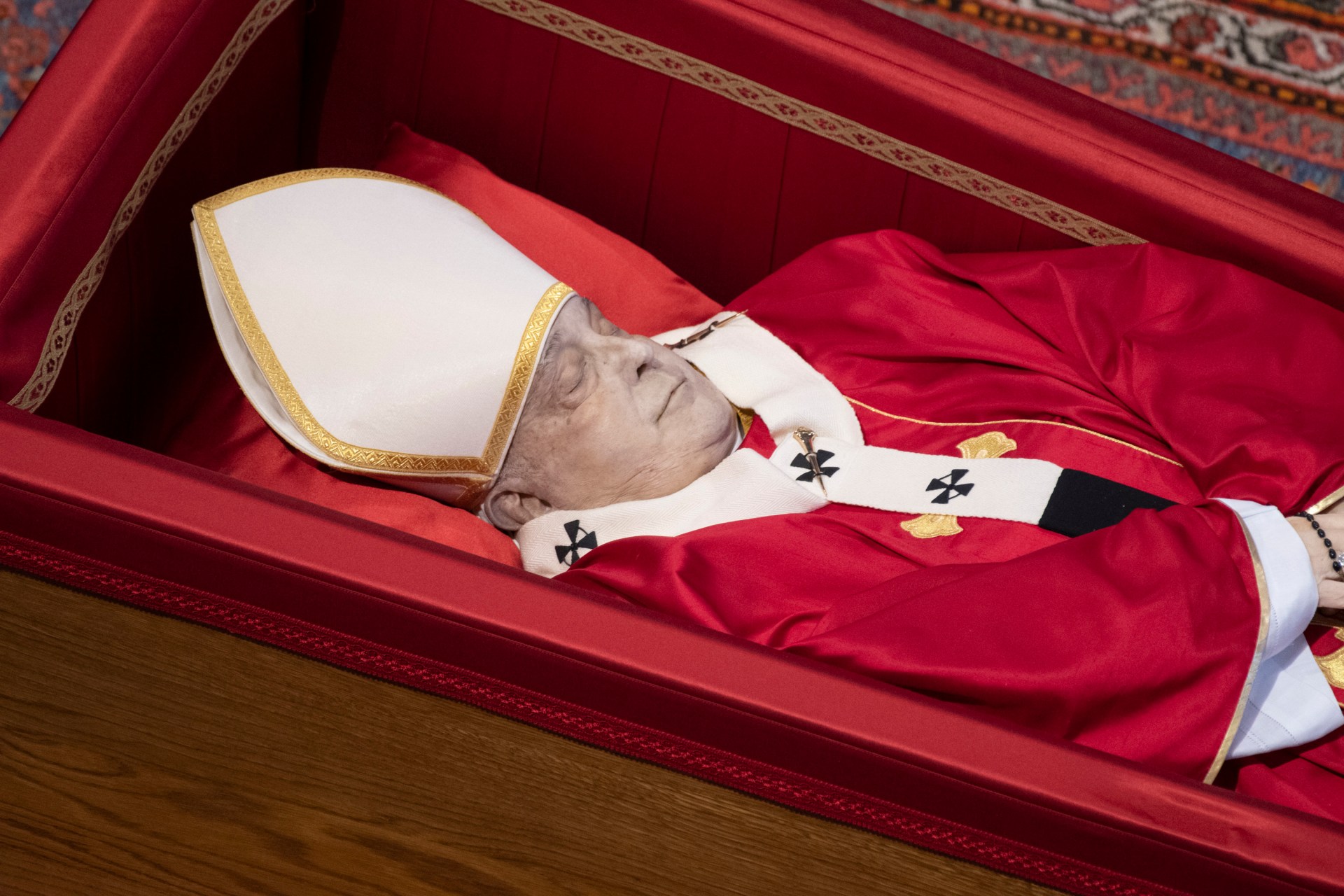 coffin of the late Pope Francis inside St Peter's Basilica as it is transported in a procession from the chapel of Santa Marta to St Peter's Basilica, following the Pope's death, in the Vatican on April 23, 2025.
