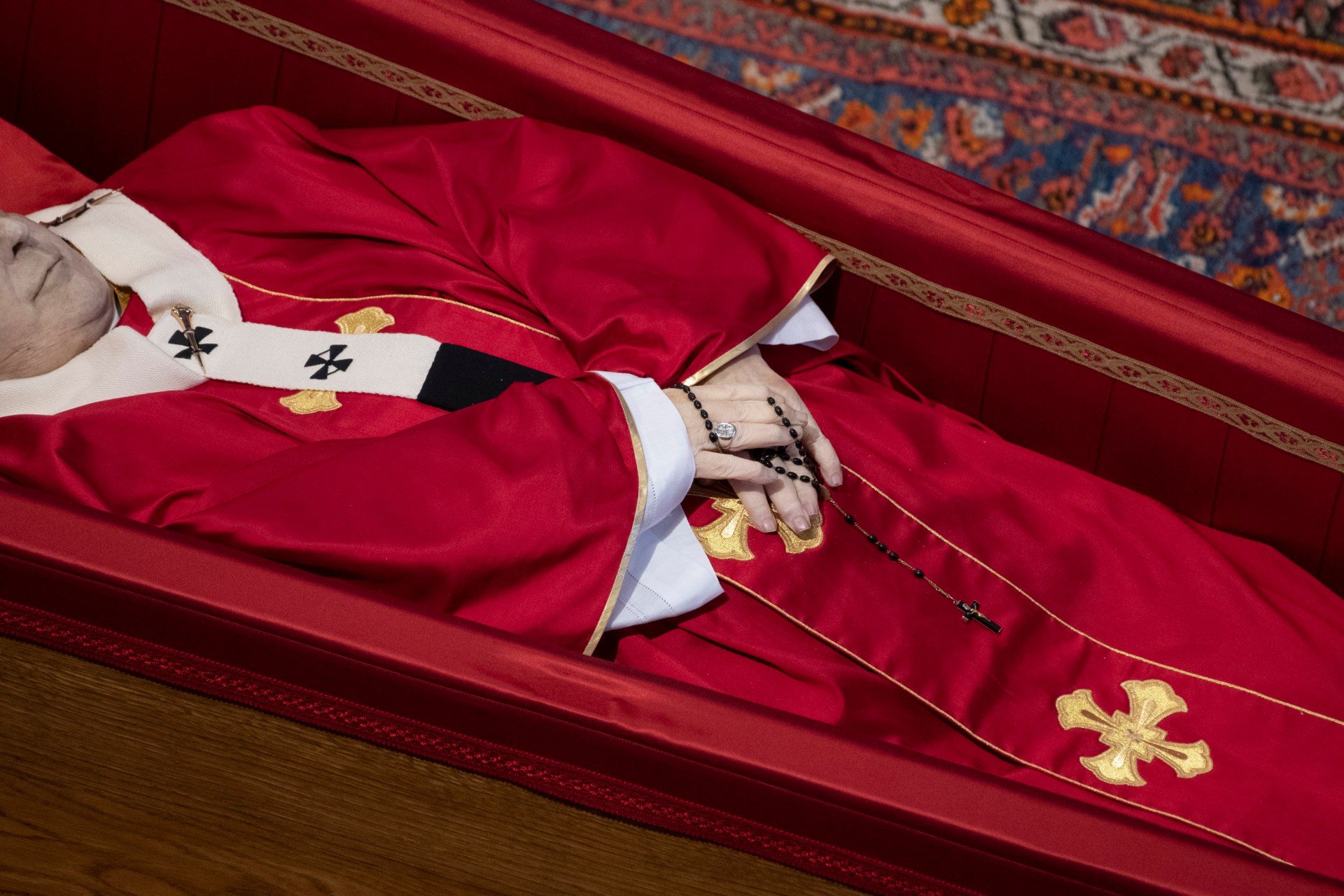coffin of the late Pope Francis inside St Peter's Basilica as it is transported in a procession from the chapel of Santa Marta to St Peter's Basilica, following the Pope's death, in the Vatican on April 23, 2025.