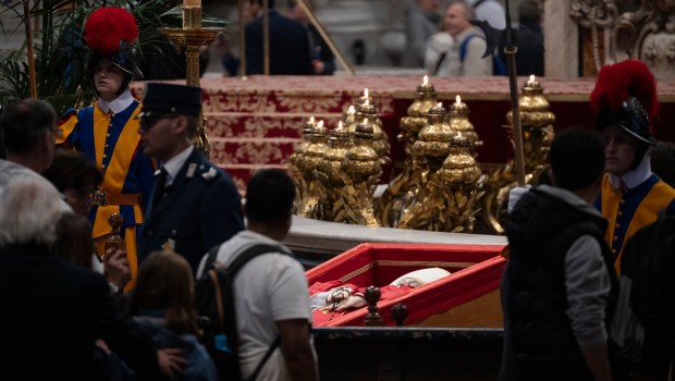 People pay their respects to late Pope Francis as he lies in state at St Peter's Basilica in The Vatican, on April 24, 2025.