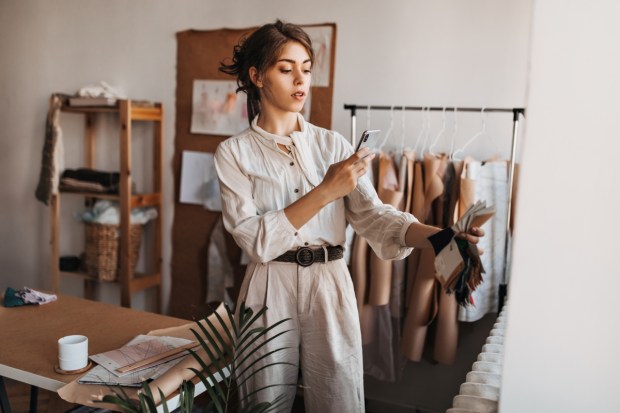 Stylish woman in beige outfit