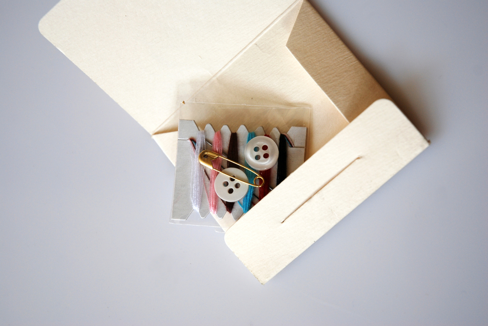 Sewing Kit for first Aid on grey background