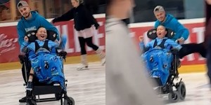 Deček s cerebralno paralizo je žarel od veselja, ko ga je mladi neznanec zavrtel po ledu