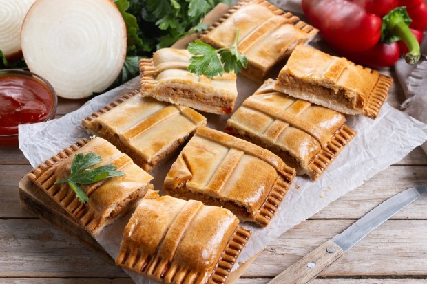 Tuna pie on wooden table(empanada gallega)
