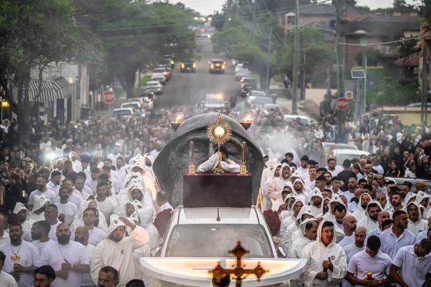 eucharistic-procession-largest-bronze-sculpture-saint-charbels-face-australia