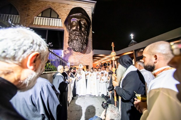 eucharistic-procession-largest-bronze-sculpture-saint-charbels-face-australia