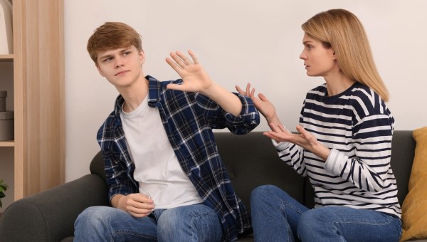 Mother and her teenage son having argument