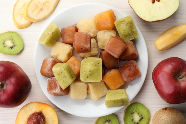Different frozen fruit puree cubes