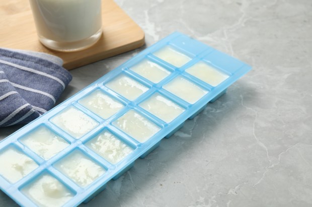 Ice cube tray with frozen mil